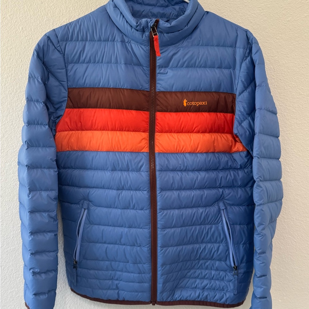 Cotopaxi Blue Jacket with Orange Logo